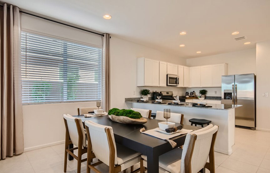 Lewis model home Dining and Kitchen by Lennar Homes in Alamar community in Avondale, AZ