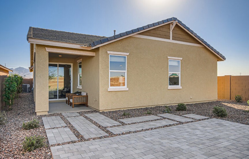 Lewis model home covered patio and rear yard by Lennar Homes in Alamar community in Avondale, AZ
