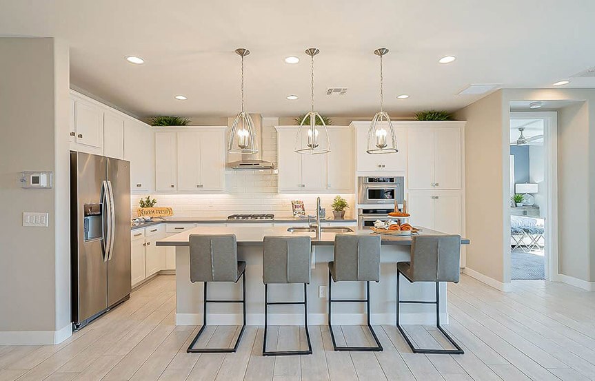 Castellano model home Kitchen island by Brightland Homes at Alamar community in Avondale, AZ