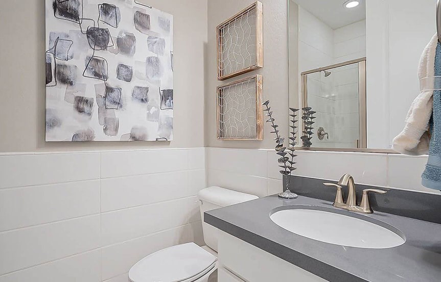 Castellano model home bath by Brightland Homes at Alamar community in Avondale, AZ