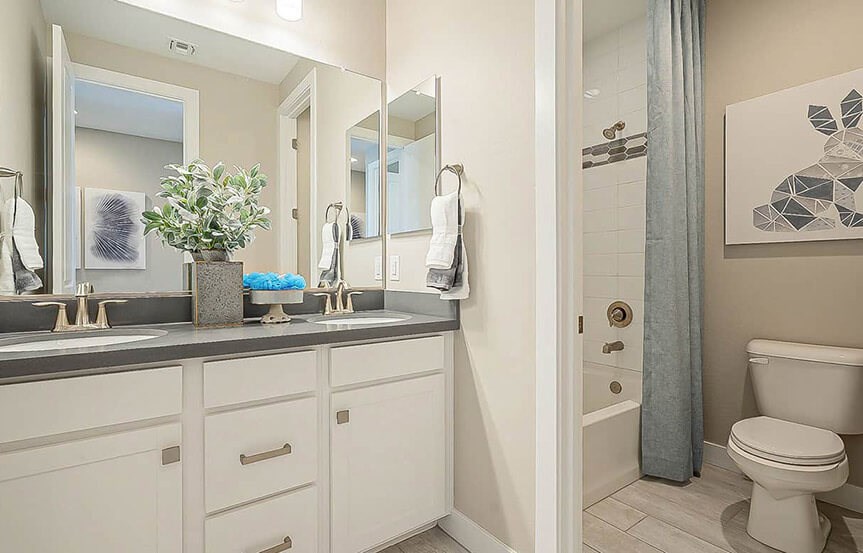 Castellano model home bathroom by Brightland Homes at Alamar community in Avondale, AZ