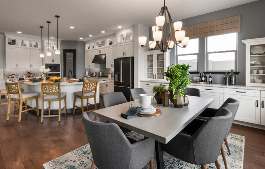 Azalea model Kitchen and Dining by David Weekley Homes at Alamar in Avondale, AZ
